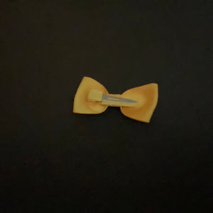 Bow - gold grosgrain on clip